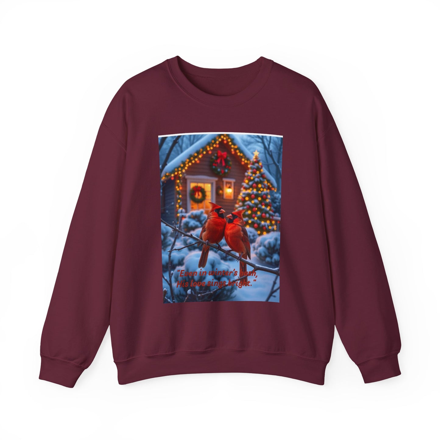 Two red cardinals perched outside a glowing cabin. The message, “Even in winter’s hush, His love sings bright,”